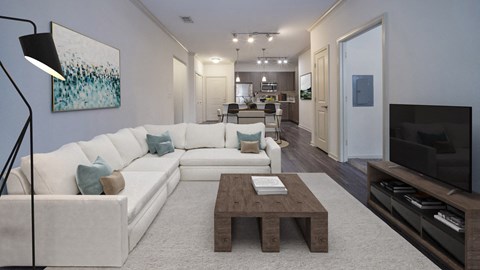 a living room with a white couch and a coffee table